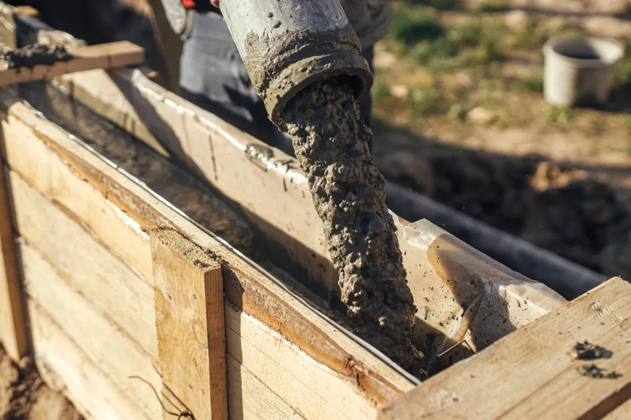 Concrete pouring into form