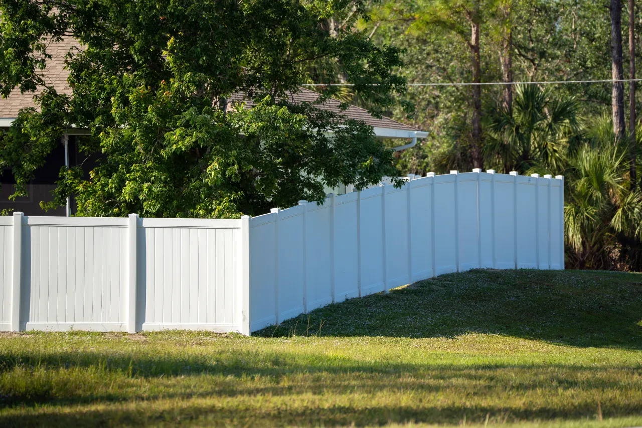 White vinyl picket fence